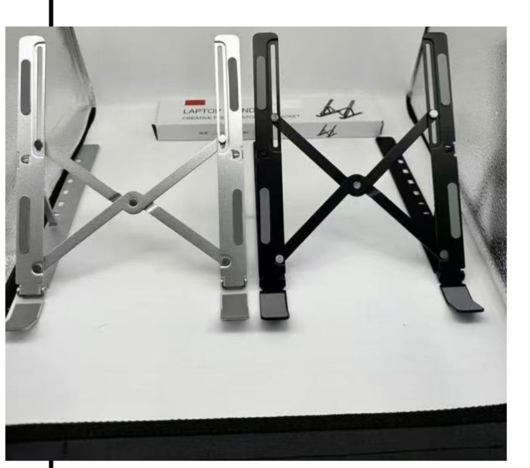 Premium Metal Laptop Stand – Portable &amp; Adjustable (Random Colors)